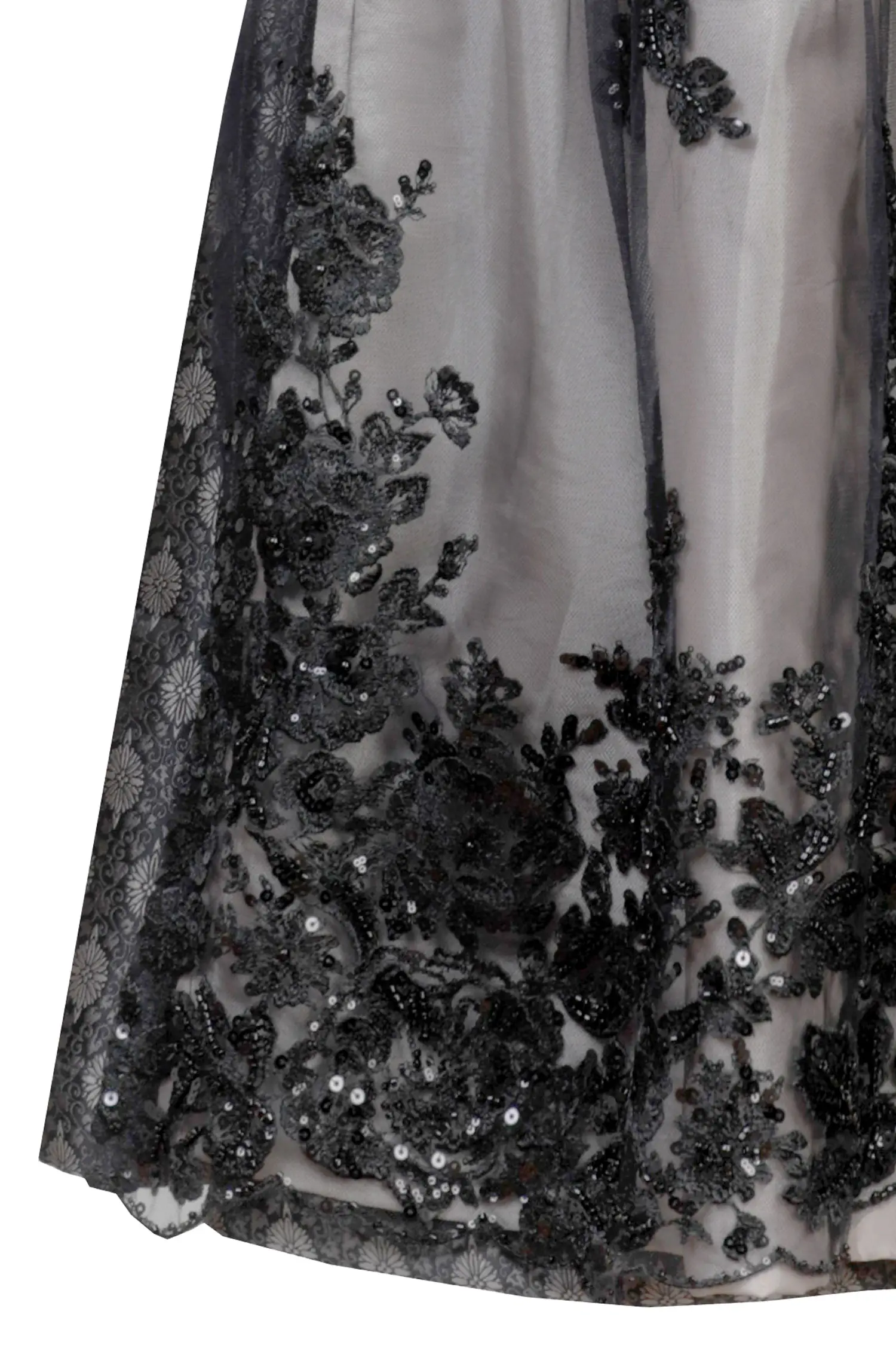 Dirndl June in schwarz mit doppelt hinterlegter Glitzerschürze - Detail Rock