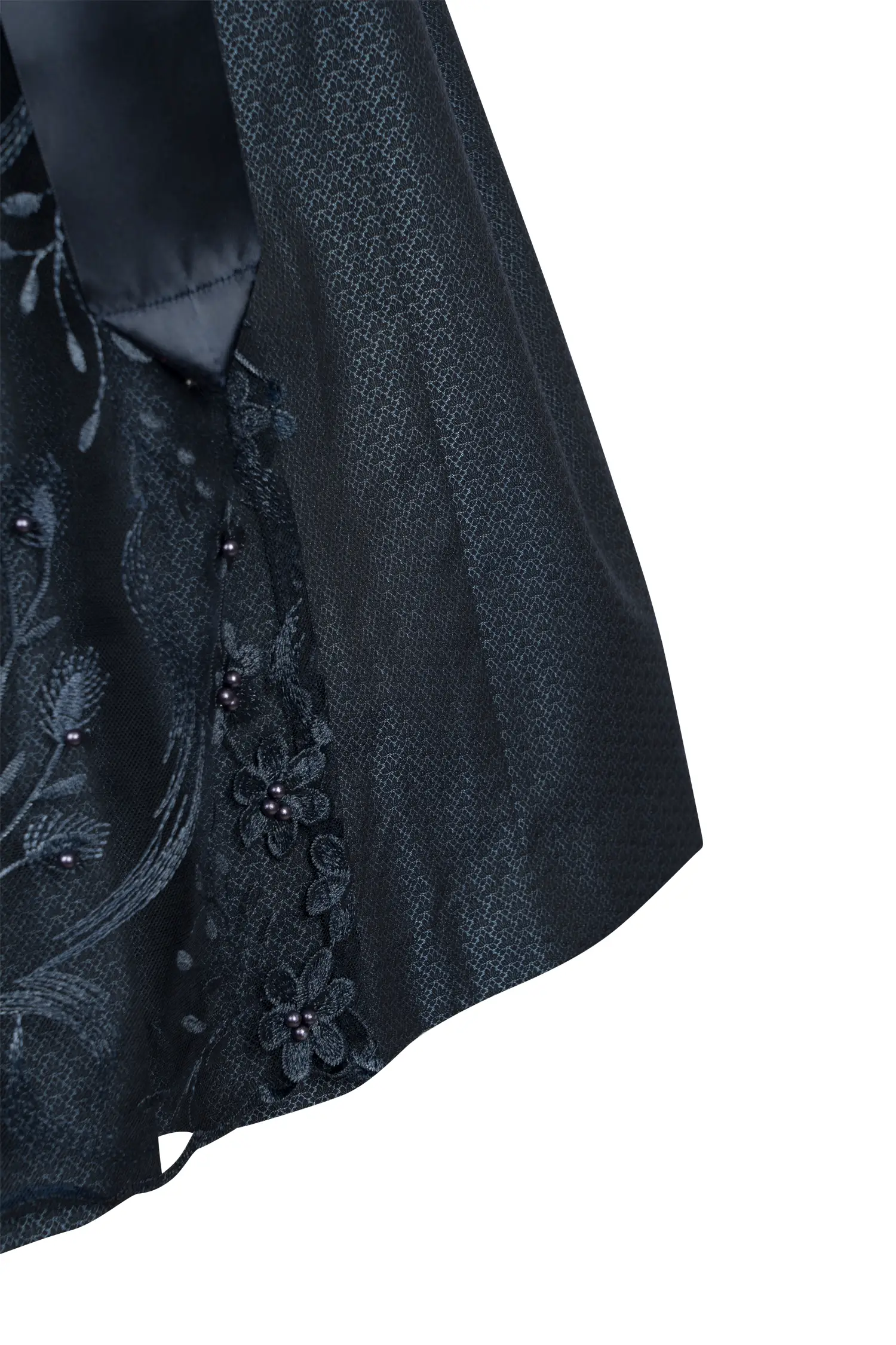Dirndl Isa in dunkelblau mit Netzschürze - Detail Rock