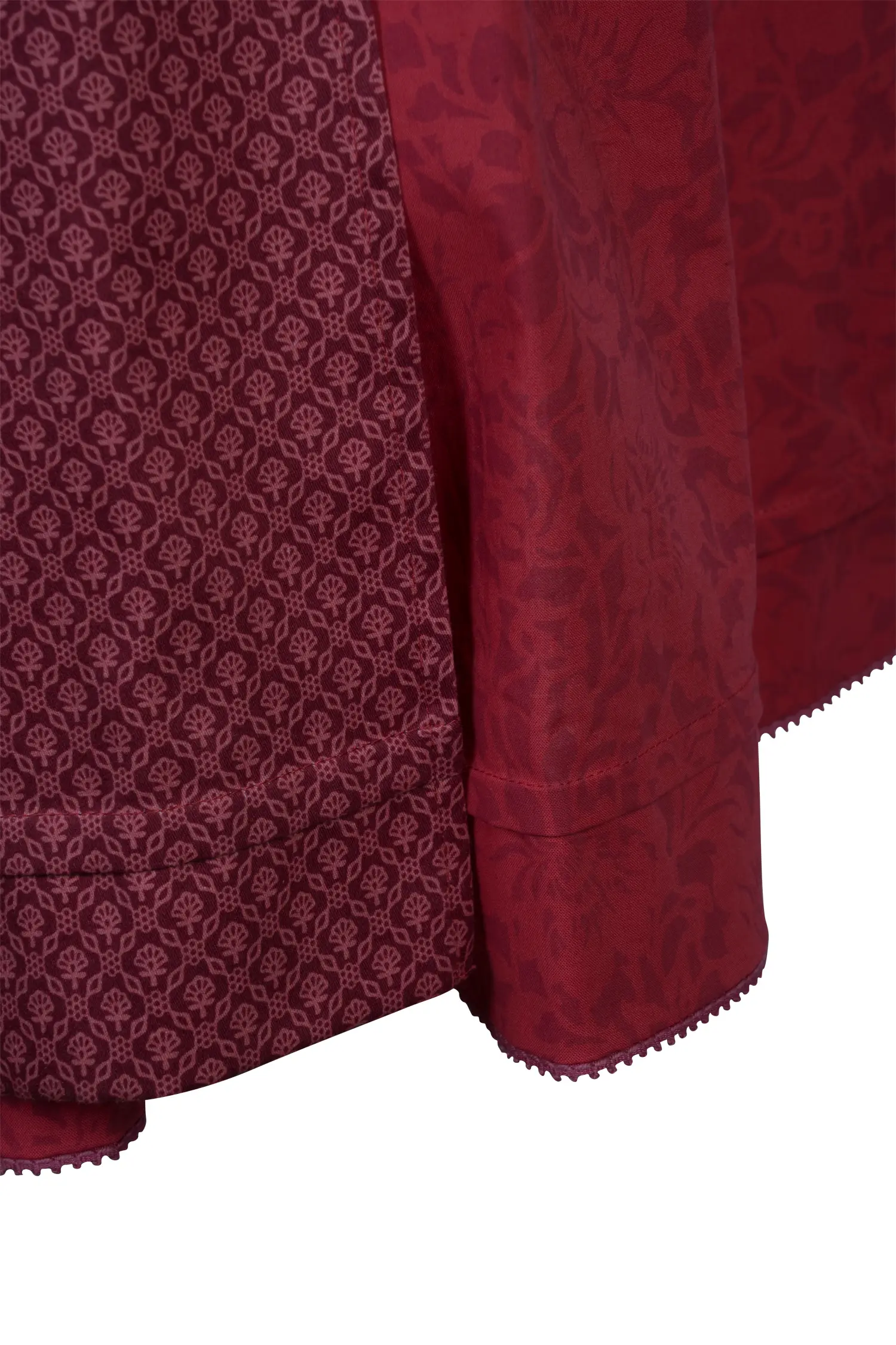 Sportalm Dirndl in leuchtendem Rot - Detail Rock